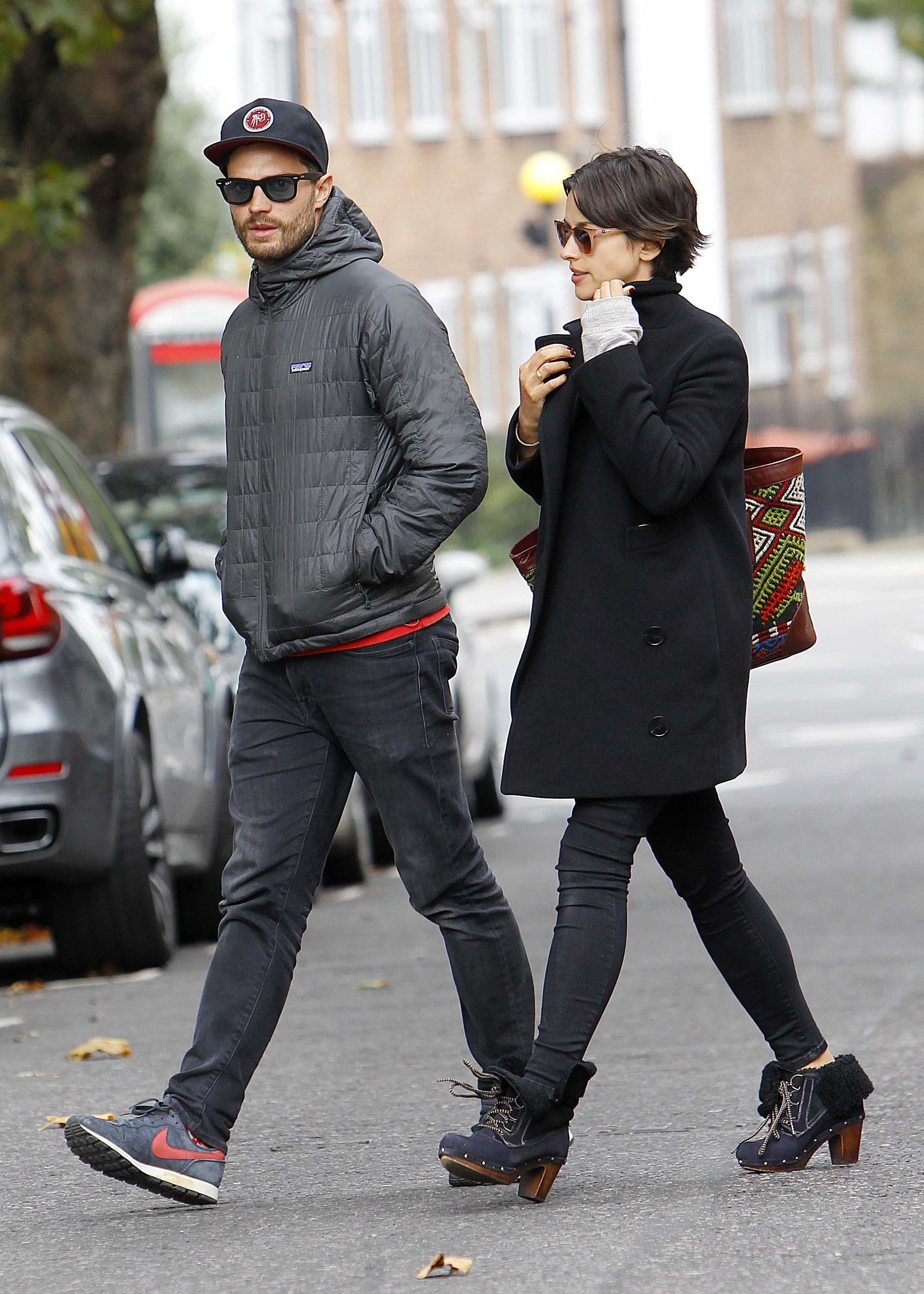 LONDON, ENGLAND - OCTOBER 13: (EXCLUSIVE COVERAGE) (MINIMUM ONLINE/WEB USAGE FEE £150 FOR THE SET) Jamie Dornan and his wife Amelia Warner sighting on October 13, 2015 in London, England. (Photo by Crowder/Legge/GC Images)